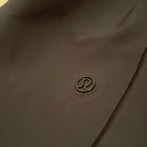 Lululemon black raincoat size 2. Beautiful jacket in perfect condition. - Picture 6 of 9